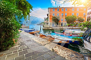 Fishing boats in harbor of Limone sul Garda, Lombardy, Italy photo