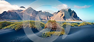 Stunning summer scene of Stokksnes cape with Vestrahorn Batman Mountain on background,