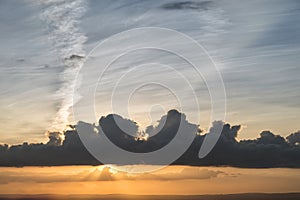 Stunning Summer sunset over countryside landscape of field with