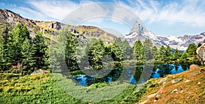 Stunning summer view of Grindjisee lake. Sunny morning scene of Matterhorn Monte Cervino, Mont Cervin peak, Swiss Alps, Zermatt