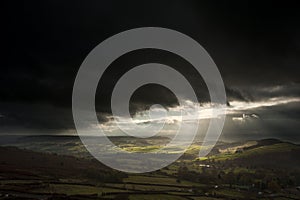 Stunning sun beams over Big Moor in Peak District National Park