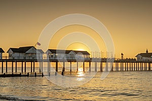 A stunning sunrise behind the pier at southwold in suffolk