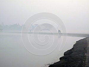 A stunning sunrise looking over the holiest of rivers in India. Ganges delta in Sundarbands photo