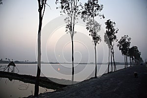 Stunning sunrise looking over the holiest of rivers in India photo