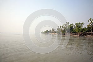 Stunning sunrise looking over the holiest of rivers in India photo