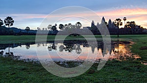 Stunning Sunrise and reflections at Angkor Wat - Siem Reap - Cambodia Biggest religious monument on the World.