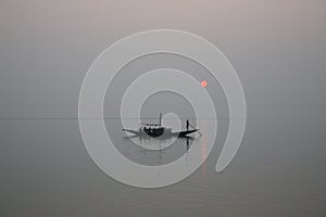 Stunning sunset looking over the holiest of rivers in India photo