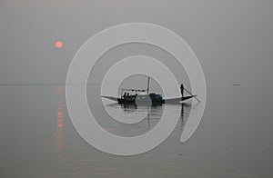 Stunning sunset looking over the holiest of rivers in India photo