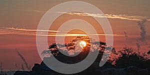 Stunning Sunset with Partially Hidden Sun