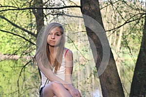 Stunning teenage girl in forest