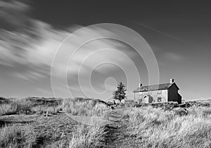 Stunning toned black and white landscape image of Nun`s Cross Fa photo