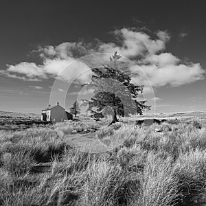 Stunning toned black and white landscape image of Nun`s Cross Fa photo