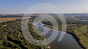 Stunning top view of the sinuous Dniester River. Summer landscape of the Dniester River. Picturesque photo wallpaper. Discover the
