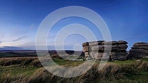 Combestone Tor Combestone Tor Dartmoor sits in a strange spot a little on its own on the south moor. photo