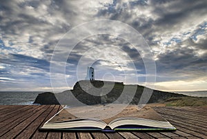 Stunning Twr Mawr lighthouse landscape from beach with dramatic