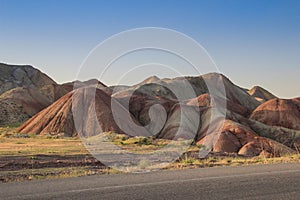 Stunning unusual colored mountains in Iran near Tabriz. Unusual geology with colorful sand in the hills. Natural attractions of