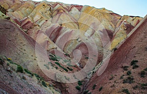 Stunning unusual colored mountains in Iran near Tabriz. Unusual geology with colorful sand in the hills. Natural attractions of