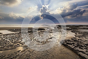 Stunning vibrant sunset landscape over Dunraven Bay in Wales