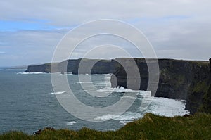 Stunning view of Aillte an Mhothair and blue waters photo