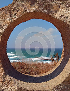 Stunning view of the beach of Ampurias from the sculpture of Cerchio magico di Lu Bagnu - North Sardinia - ITALY photo