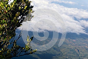 stunning view of clouds and distant mountains in the background