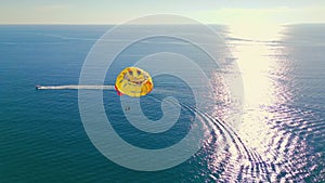 stunning view of colorful parasail wing flying over the bright blue sea, Alanya, Turkey