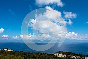 Stunning view down to the sea and the surrounding area from top of the mountain in Ereikoussa island, Greece