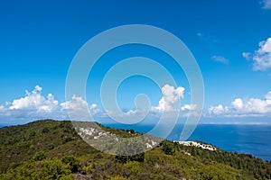 Stunning view down to the sea and the surrounding area from top of the mountain in Ereikoussa island, Greece