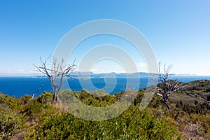 Stunning view down to the sea and the surrounding area from top of the mountain in Mathraki island, Greece