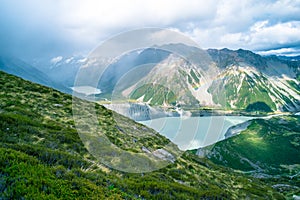 Stunning view on the high mountain after the rain with colorful rainbow over the rocky mountain and glacier in Mt Cook National