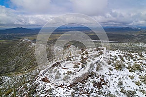 Stunning view of Hohokam ruins blanketed in snow and situated in the Tonto National Forest