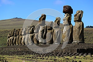 Stunning view of 15 huge Moai statues of Ahu Tongariki with Poike volcano in the background, Easter Island