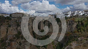 Stunning view of the massive old bridge between the cliffs in Ronda, Spain, 4k