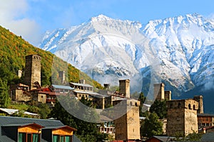 Stunning View of Medieval Svan Tower-houses against the Snow-capped Caucasus Mountain in Mestia, Georgia