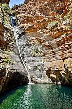 Stunning view of Meiringspoort Waterfall in the Swartberg Mountain range near De Rust, Klein Karoo, South Africa.