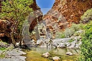 Stunning view of Meiringspoort Waterfall in the Swartberg Mountain range near De Rust, Klein Karoo, South Africa.