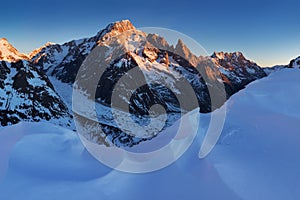 Stunning view of Mont Blanc massif and his melting glaciers. Winter adventures in the Italian French Alps. Courmayeur, Aosta.