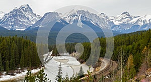 Stunning view of Morant\'s Curve Railway and Rocky montains in Banff National Park, Alberta, Canada