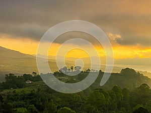 Stunning view on mount Abang and lake Batur at sunrise