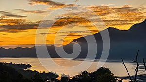 Stunning view on mount Abang and lake Batur at sunrise