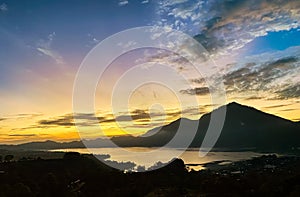 Stunning view on mount Abang and lake Batur at sunrise photo
