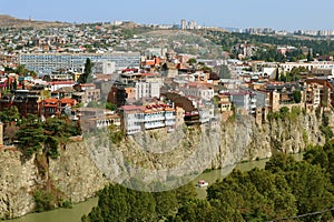Stunning View of the Old Building on the Elevated Cliff Overlooks the Mtkvari River in Tbilisi, Georgia
