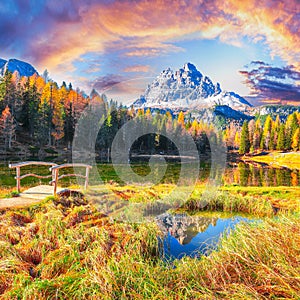 Stunning view of popular travel destination mountain lake Antorno in autumn photo