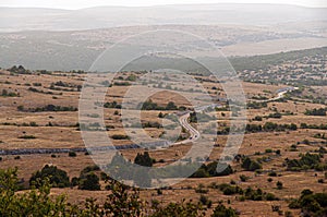 A stunning view of the valley with distant road