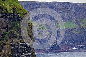 Stunning view of the vertical walls of the Cliffs of Moher