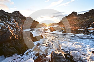 Stunning view of Ã–xarÃ¡rfoss Waterfall at Thingvellir National Park during sunset. These waterfalls are situated between two