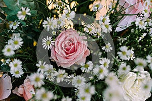 A stunning wedding decoration featuring an array of flowers elegantly combined