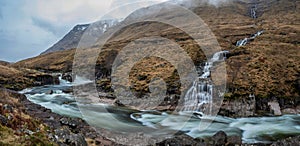 Stunning Winter landscape image of River Etive and Skyfall Etive Waterfalls in Scottish Highlands photo