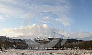 A winter landscape view of the dramatic mountains at Kinloch Rannoch, Perthshire, Scotland, UK.