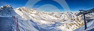 Stunning winter panorama in Tonale ski resort. View of Adamello, Presanella mountains from Tonale town, Italian Alps, Europe